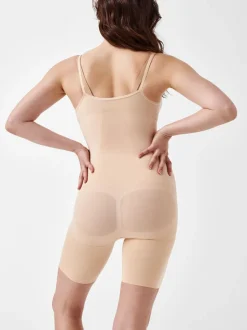 Shapewear*Spanx - sculpt™ Naadloze Power bodysuit met open buste tot halverwege de dij Licht beige