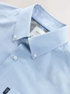 Formele Overhemden|Shirts|Next Lichtblauw - Normale Pasvorm - Gemakkelijk te strijken Oxford overhemd met doorlopende knopen