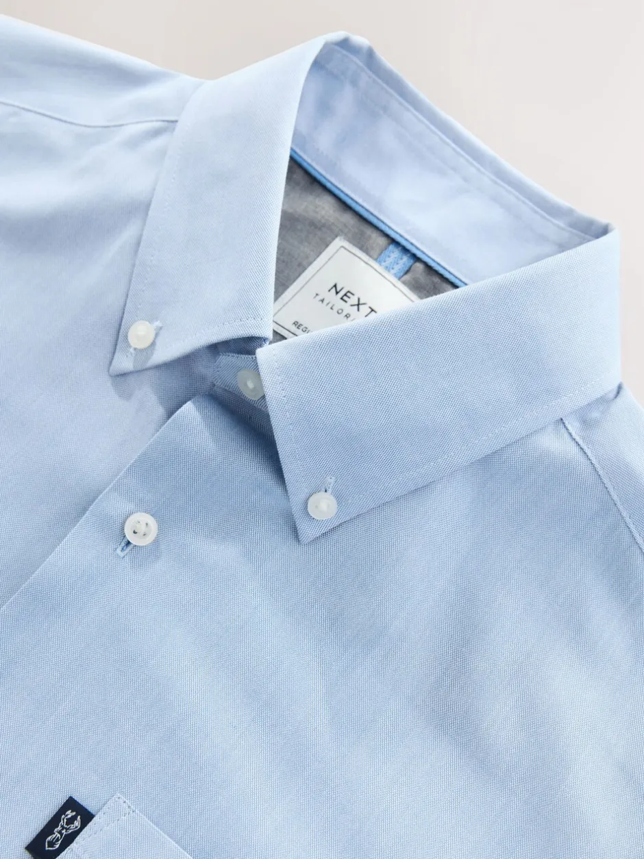 Formele Overhemden|Shirts|Next Lichtblauw - Normale Pasvorm - Gemakkelijk te strijken Oxford overhemd met doorlopende knopen