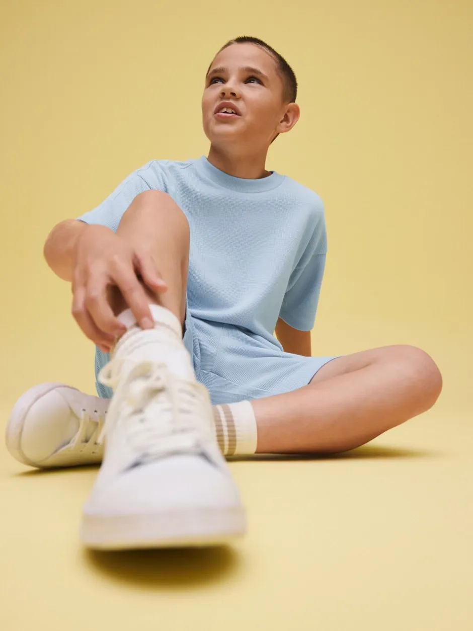 Shorts*Next - Set van T-shirt met textuur en korte mouwen en shorts (3 - 16 jr) Lichtblauw