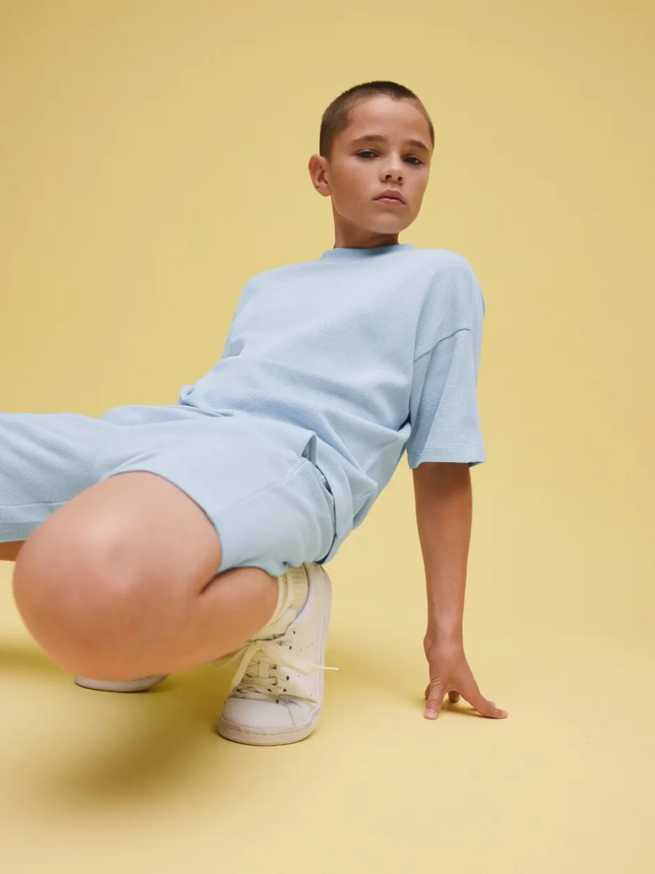 Shorts*Next - Set van T-shirt met textuur en korte mouwen en shorts (3 - 16 jr) Lichtblauw