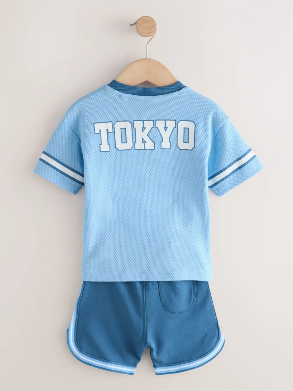 Shorts*Next - Short Sleeve Varsity Shorts Set (3mths-7yrs) Lichtblauw