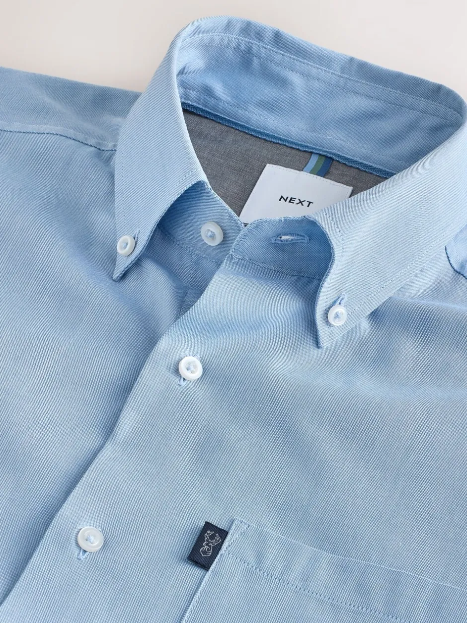 Formele Overhemden|Next Lichtblauw - Slim Fit - Gemakkelijk te strijken Oxford overhemd met doorlopende knopen