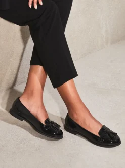 Lage Schoenen*Lipsy - Lakleren platte instappers met kwastjes