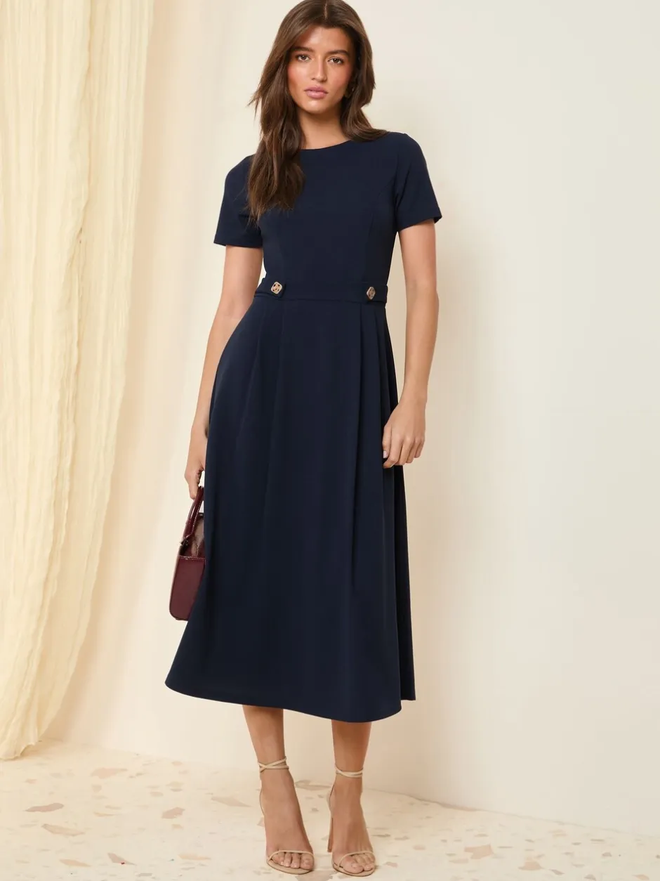 Jurken*Friends Like These Marineblauw - Getailleerde midi-jurk met tabdetail en korte mouwen
