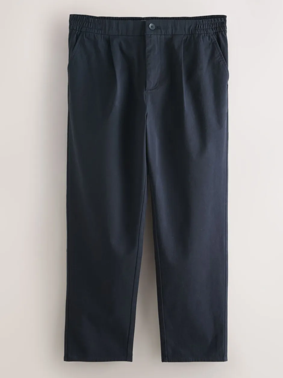 Broeken En Chino's*Next - Standaard toelopende pasvorm - Pleated Stretch Chinos Trousers With Elasticated Waist Marineblauw