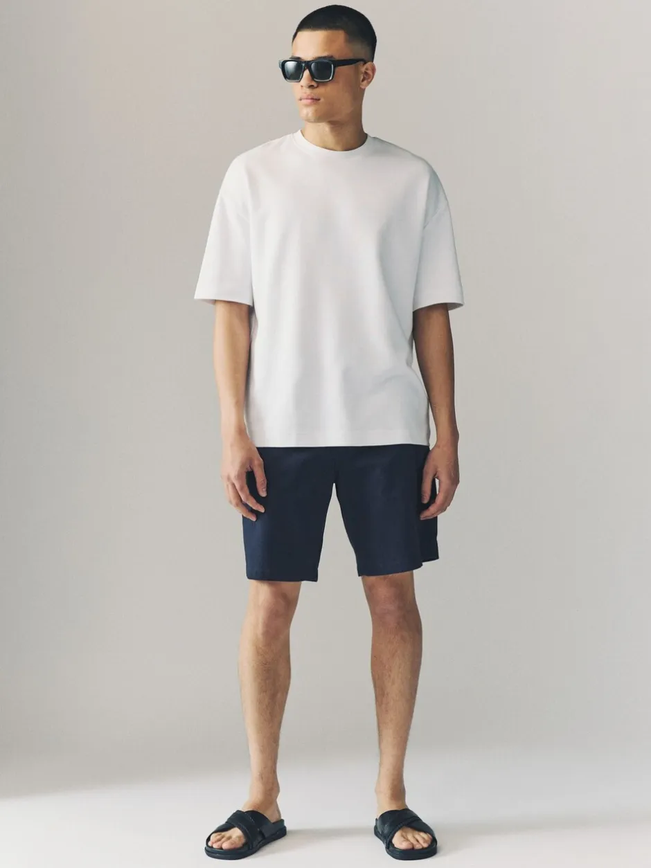 Shorts*Next - Ruimvallende pasvorm. - Set van 2 chinoshorts met stretch Marineblauw/kiezelkleurig