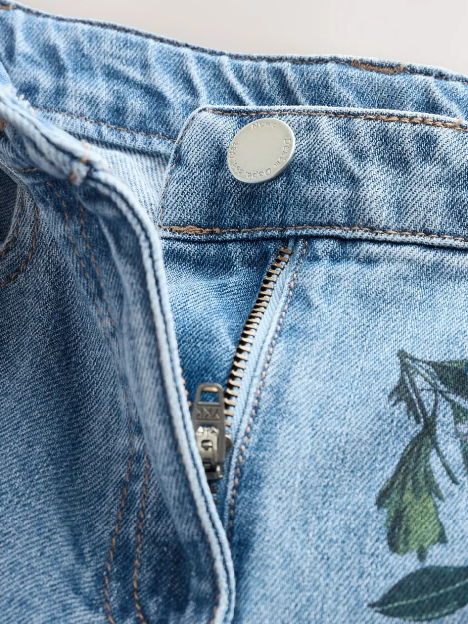 Jeans*Next Medium blauwe denim met bloemenprint - Jeans met wijde pijpen (3-16 jr)