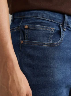 Jeans|Next Mediumblauw - Klassieke stretchjeans met standaard taps toelopende pasvorm