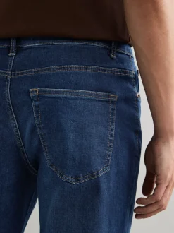 Jeans|Next Mediumblauw - Klassieke stretchjeans met standaard taps toelopende pasvorm