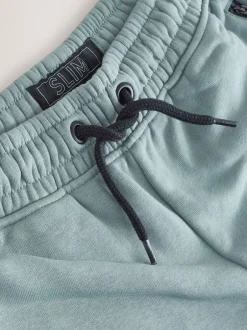 Joggingbroeken*Next - Verpakking van 3 slim fit joggingbroeken met (3-16jaar) Meerkleurig Zwart/Marine/Mineraal