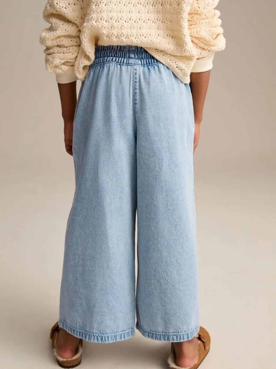 Jeans|Next - Jeans met elastische taille en wijde pijpen (3-16jr) Middenblauw denim