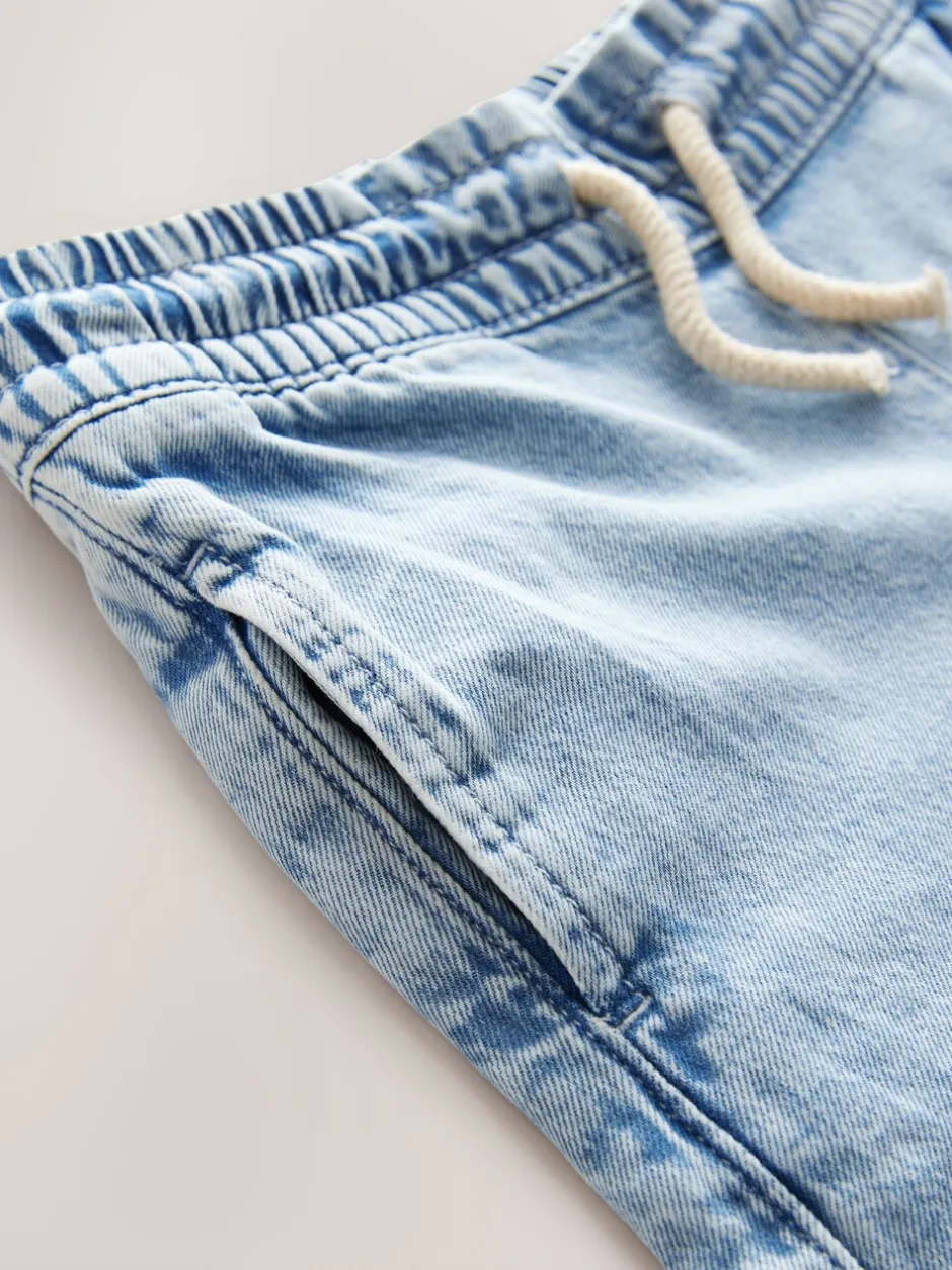 Jeans|Next - Jeans met elastische taille en wijde pijpen (3-16jr) Middenblauw denim