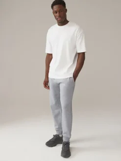 Joggingbroeken|Next - Verpakking van 3 slim-fit jersey joggingbroeken met hoog katoengehalte Multi