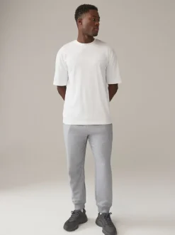 Joggingbroeken|Next - Verpakking van 3 slim-fit jersey joggingbroeken met hoog katoengehalte Multi