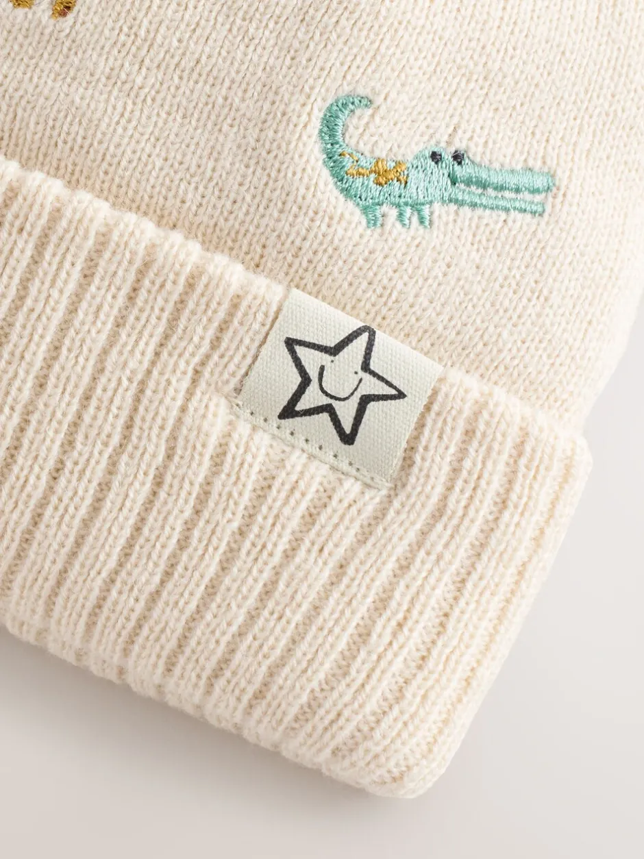 Mutsjes En Antikrabwantjes|Mutsen, Handschoenen En Sjaals|Next Naturel geborduurd met safariprint - Beanie-muts met pompon (3mnd-10jr)