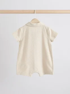 Rompertjes En Tuinbroeken|Babypakjes En Babypyjama's|Next - Verpakking van 2 gestructureerde babyrompertjes Neutraal/kaki