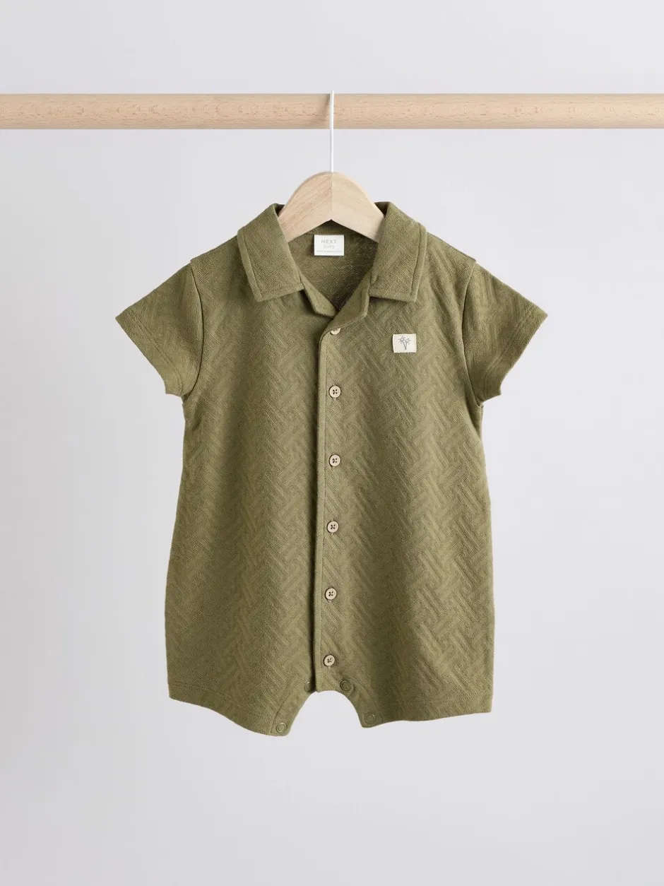 Rompertjes En Tuinbroeken|Babypakjes En Babypyjama's|Next - Verpakking van 2 gestructureerde babyrompertjes Neutraal/kaki