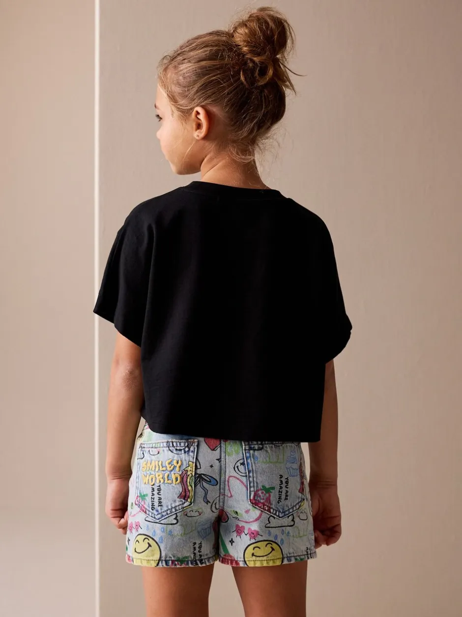 Shorts En Rokken*Next Normaal blauw - SmileyWorld® Graffiti Print Denim Shorts (3-16yrs)