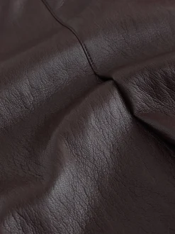 Rokken|Nothing Ordinary Faux Leather Wrap Midi Kilt Skirt