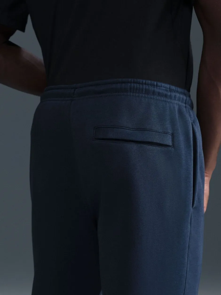 Joggingbroeken*Nike - Club Fleece joggingbroek met wijde pijpen Obsidiaan