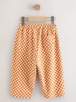 Broeken En Leggings*Next Oranje met dambordmotief - Broek met wijde kortere pijpen (3mnd -7jr)