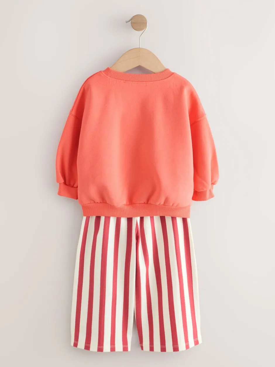 Sets En Combisets|Truien En Breisels*Next Oranje 'Squeeze the Day' - Set van sweatshirt en broek met wijde pijpen (3mnd -7jr)