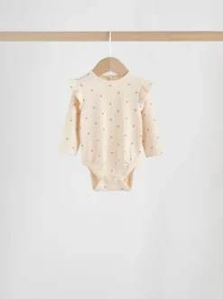 Rompertjes En Hemdjes*Next - Verpakking van 4 babyrompers met lange mouwen en ruches (0mnd-2jr) Paars/geel/crème met fijne print