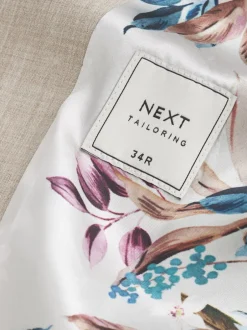 Vesten|Next Pastelgeel - Meegevend stretch-herenvest met standaard pasvorm