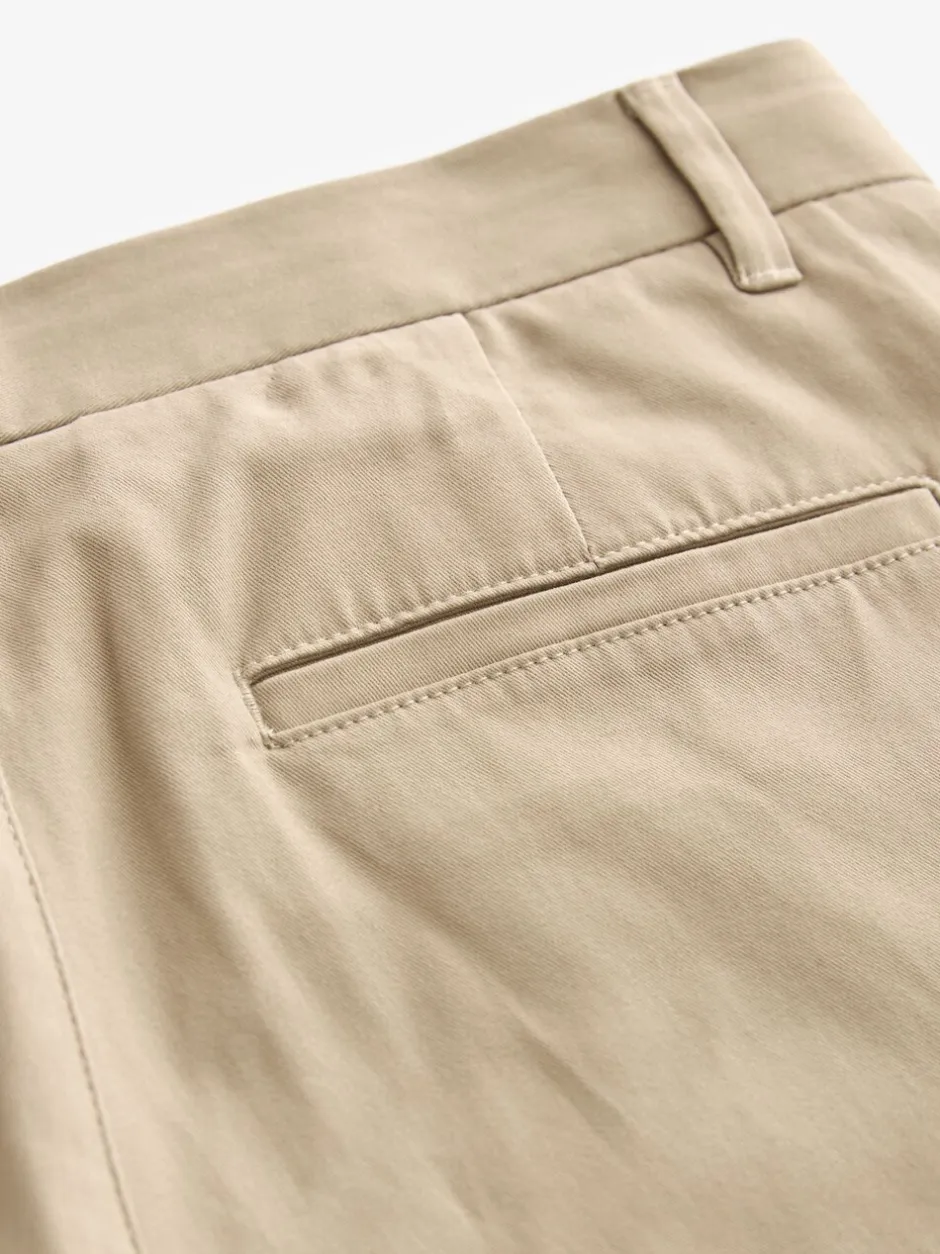 Broeken En Chino's*Next Pastelgeel - Slim Fit - Stretchy chino