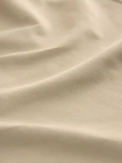 Broeken En Chino's*Next Pastelgeel - Straight fit - Stretchy chino
