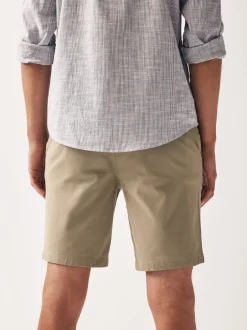 Shorts*Next - Strakke Pasvorm - Chinoshort met stretch Pastelgeel