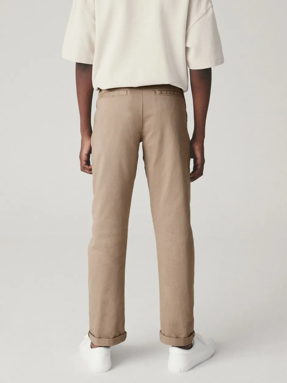 Broeken En Chino's*Next Pastelgeel - Stretchy chino's (3-17jr)