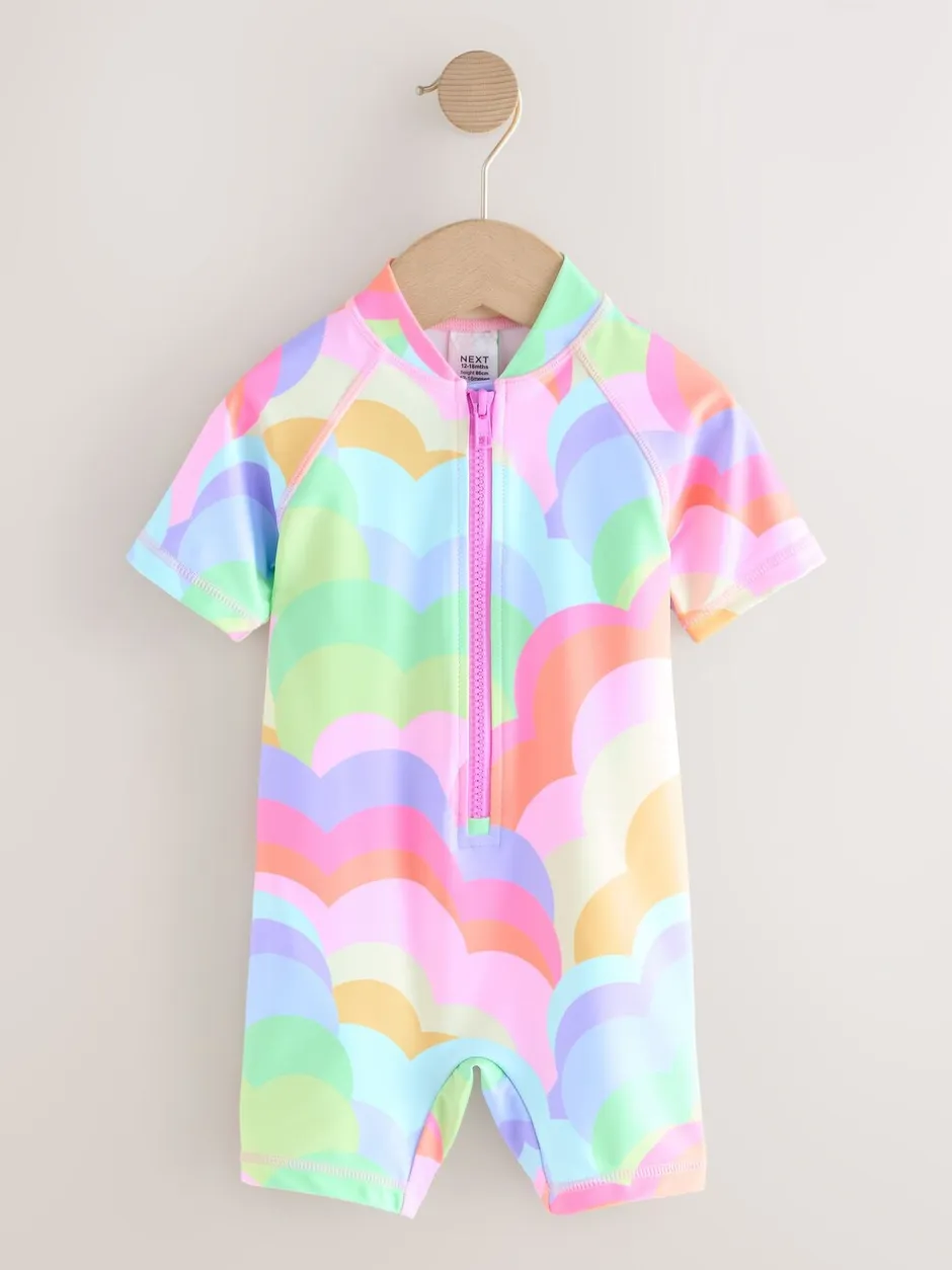 Badkleding|Badkleding|Next Regenboogkleurig met golven - Zonbeschermend badpak (3 mnd-10 jr)