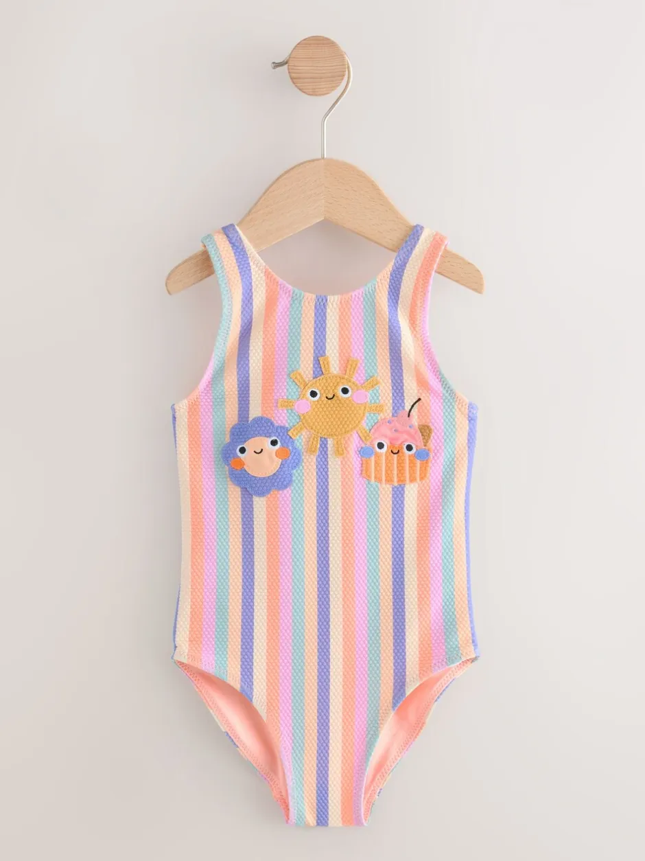 Badkleding|Badkleding*Next - Badpak (3 mnd-10 jr) regenboogkleurige figuurtjes
