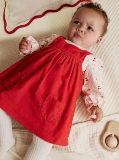 Jurken|Jurken*Next Rode strik - Set van corduroy pinafore, bodysuit met lange mouwen en maillot voor baby's (0mnd-2jr)