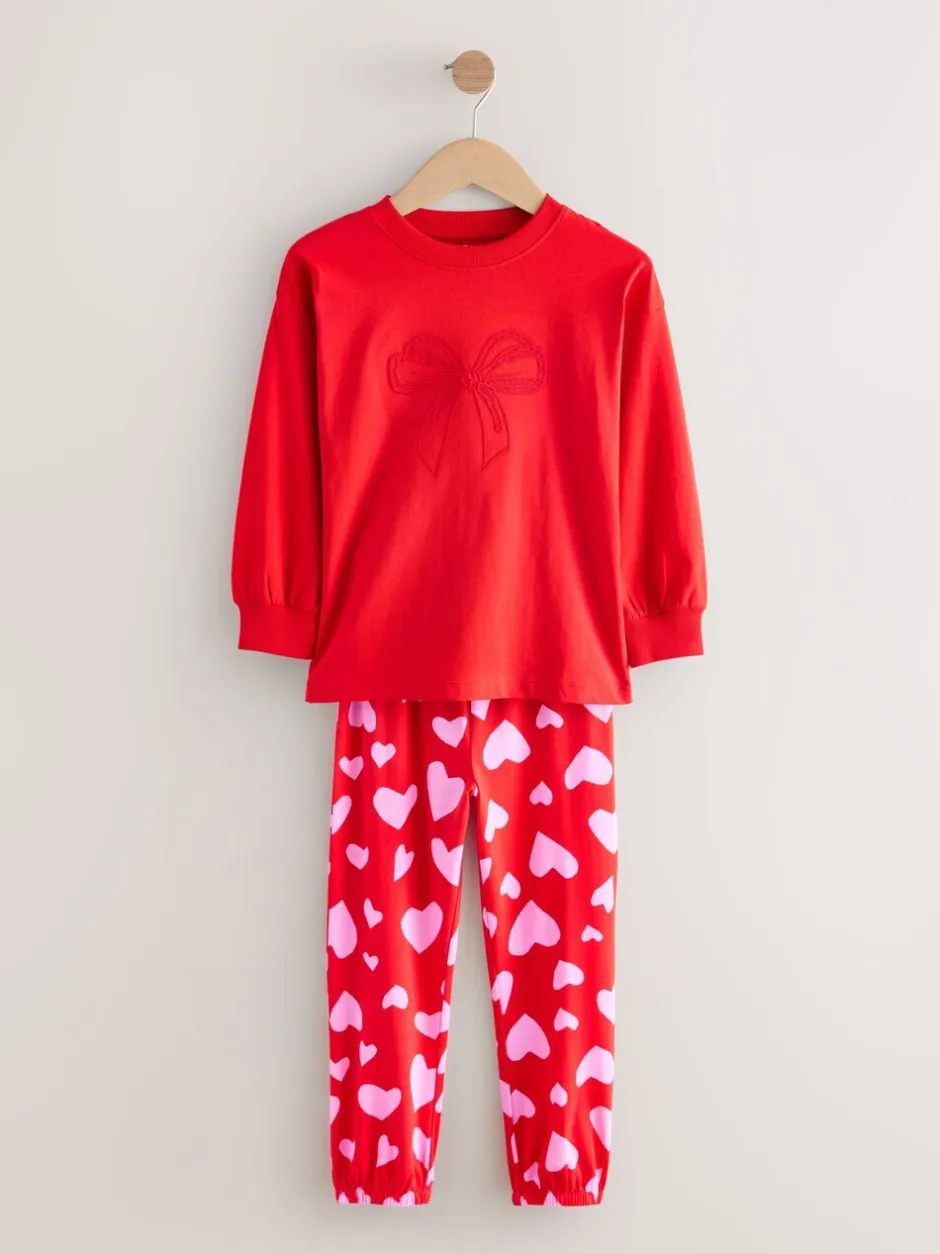 Nachtkleding En Pyjama's|Pyjama's|Next - Verpakking van 3 pyjama's met joggingbroek (3-16 jr) Rode strikken/hartjes
