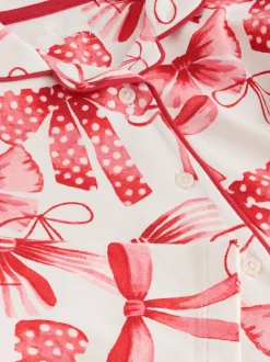 Nachtkleding En Pyjama's|Pyjama's|Next - Pyjama met knoopsluiting (3-16jr) Rode/witte strik print