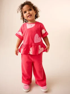 Tops|T-Shirts|Next Rood met hartjesprint - T-shirt met peplum en korte mouwen (3mnd -7jr)