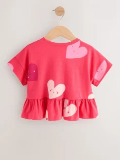 Tops|T-Shirts|Next Rood met hartjesprint - T-shirt met peplum en korte mouwen (3mnd -7jr)
