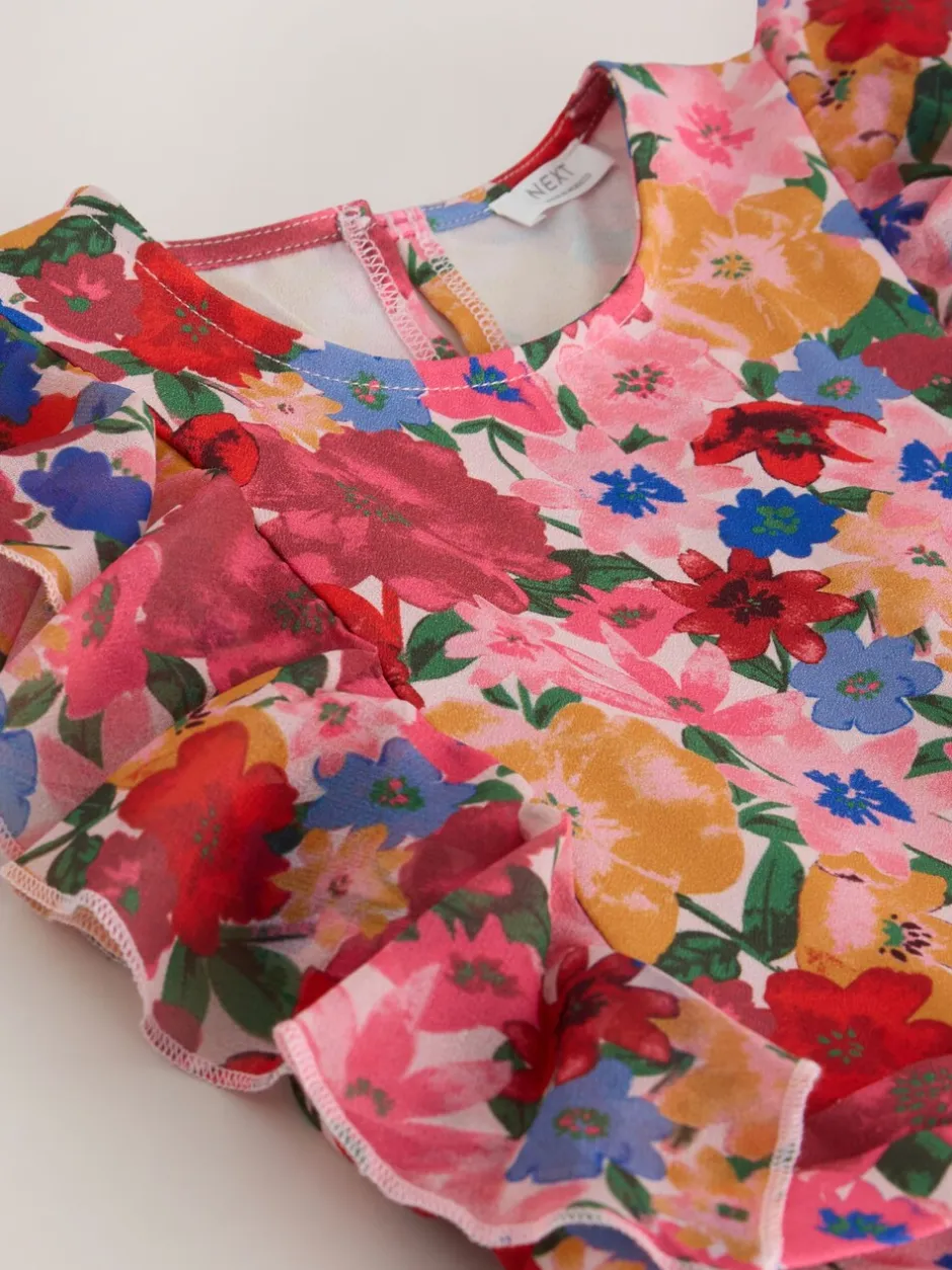 Jumpsuits En Playsuits*Next - Short Sleeve Pleated Ruffle Jumpsuit (3-16yrs) Roze bloemen