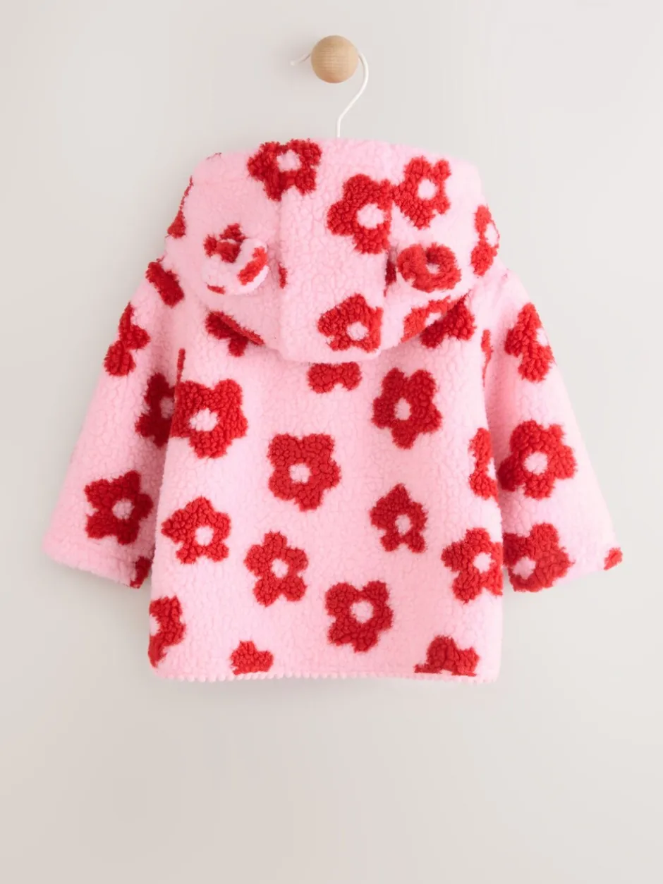 Jassen, Jacks En Kinderwagenpakjes|Jassen En Jacks|Next Roze bloemenprint over het geheel - Borg babyjack met capuchon (0mnd-2jr)