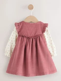 Jurken|Jurken*Next Roze met borduursel - Set van corduroy pinafore, bodysuit met lange mouwen en maillot voor baby's (0mnd-2jr)