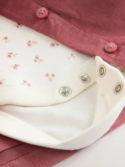 Jurken|Jurken*Next Roze met borduursel - Set van corduroy pinafore, bodysuit met lange mouwen en maillot voor baby's (0mnd-2jr)