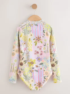 Badkleding*Next Roze met gebloemde lapjesprint - Long Sleeve Sunsafe Swimsuit (3mths-16yrs)