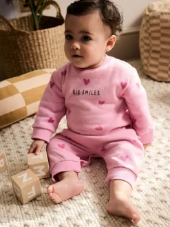 Sets En Outfits|Next - Jersey babyromper (0mnd-3jr) Roze met hartjesprint