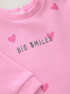 Sets En Outfits|Next - Jersey babyromper (0mnd-3jr) Roze met hartjesprint