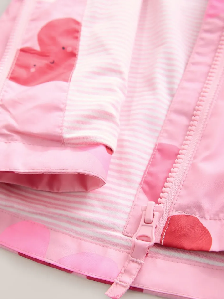 Jassen En Jacks*Next Roze met hartjesprint - Regenbestendig jack met print (3mnd-7jr)