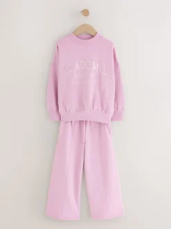 Sets En Outfits|Sweaters En Hoody´S|Next - Set van sweatshirt en joggingbroek met wijde pijpen (3-16jr) Roze met slogan