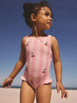 Badkleding|Badkleding|Next - Badpak met ruches op de pijpen (3mnd -7jr) Roze met streep- en kersenprint